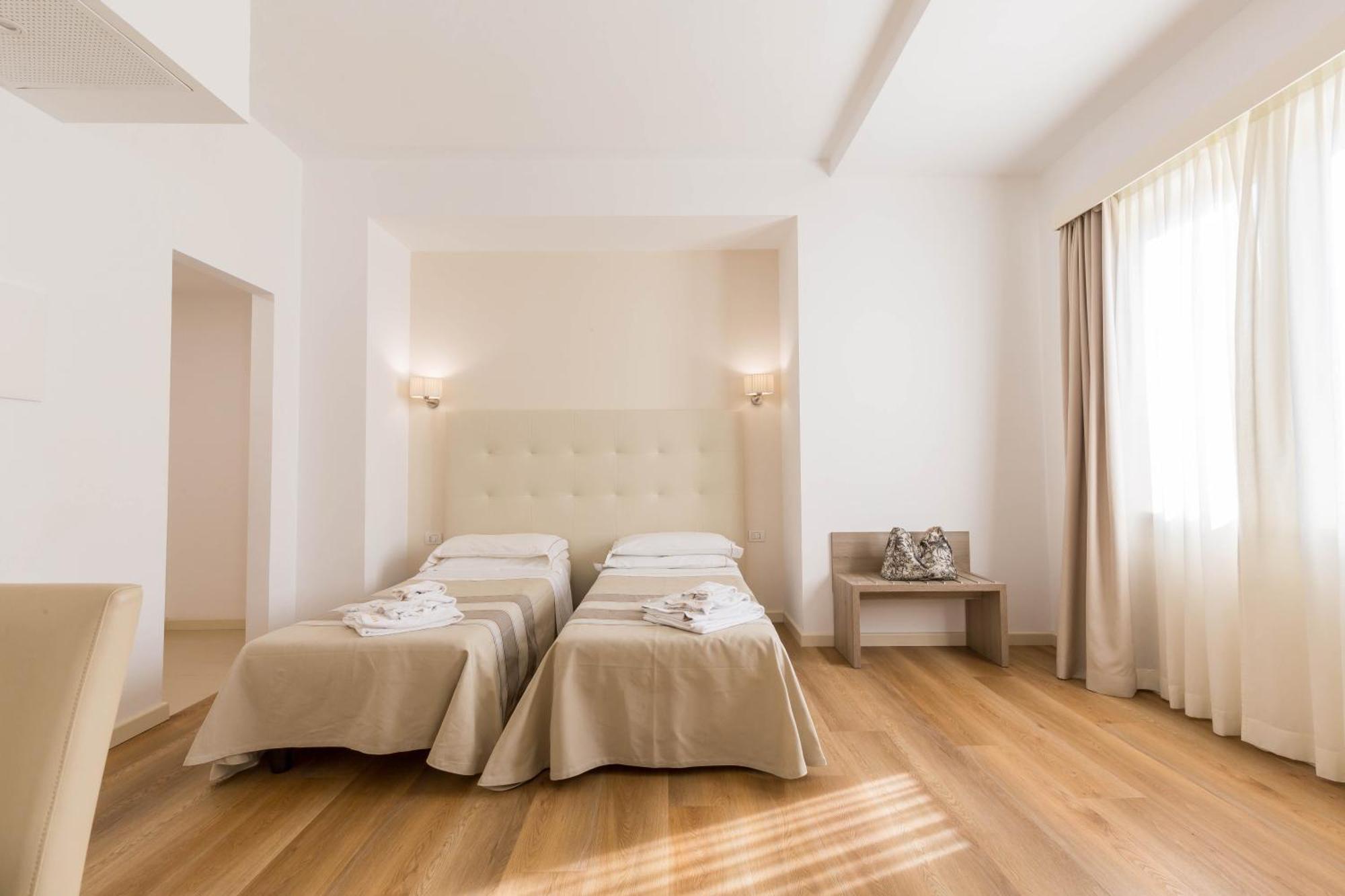 Hotel Catalunya Alghero Bagian luar foto