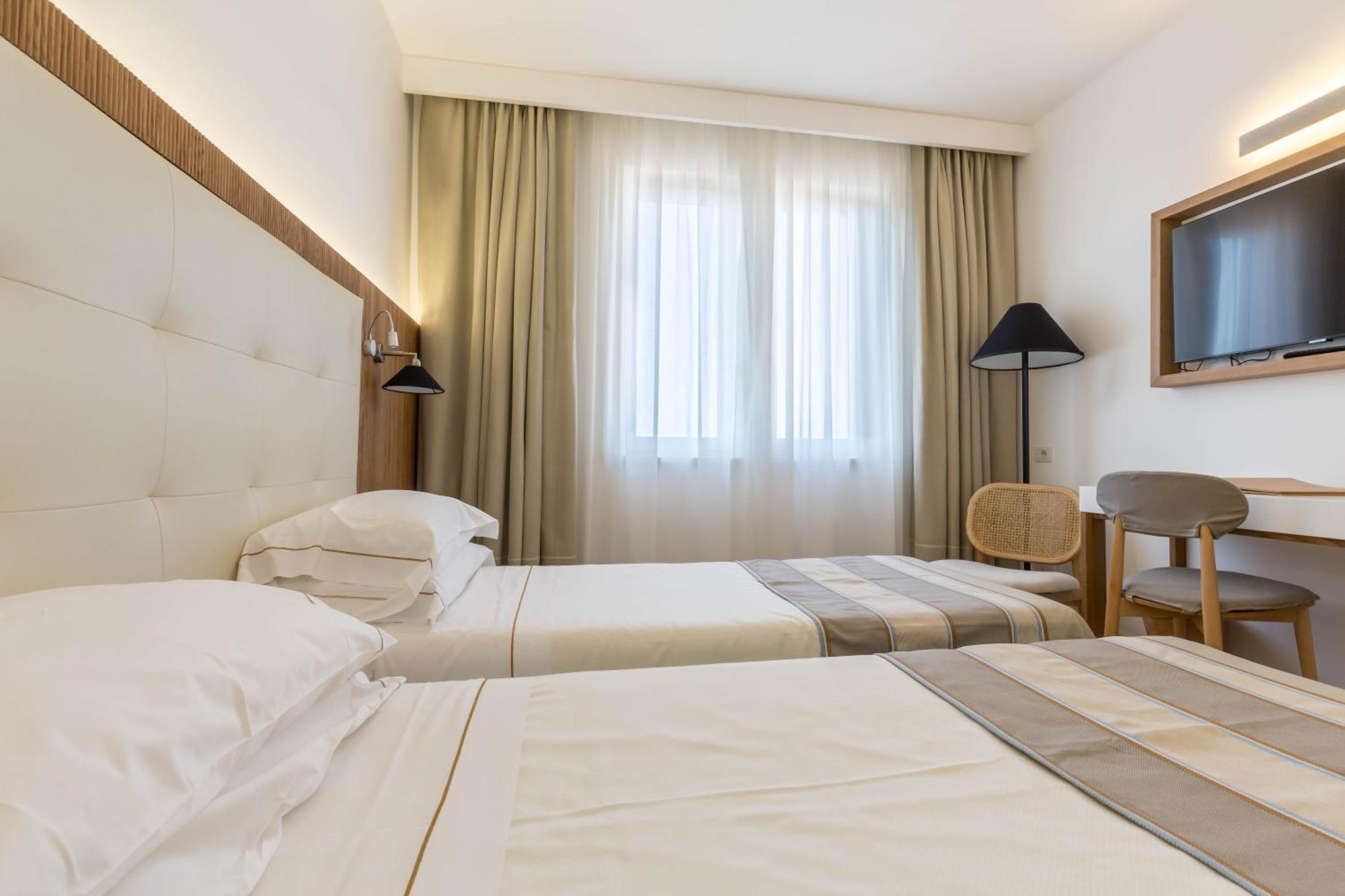 Hotel Catalunya Alghero Bagian luar foto