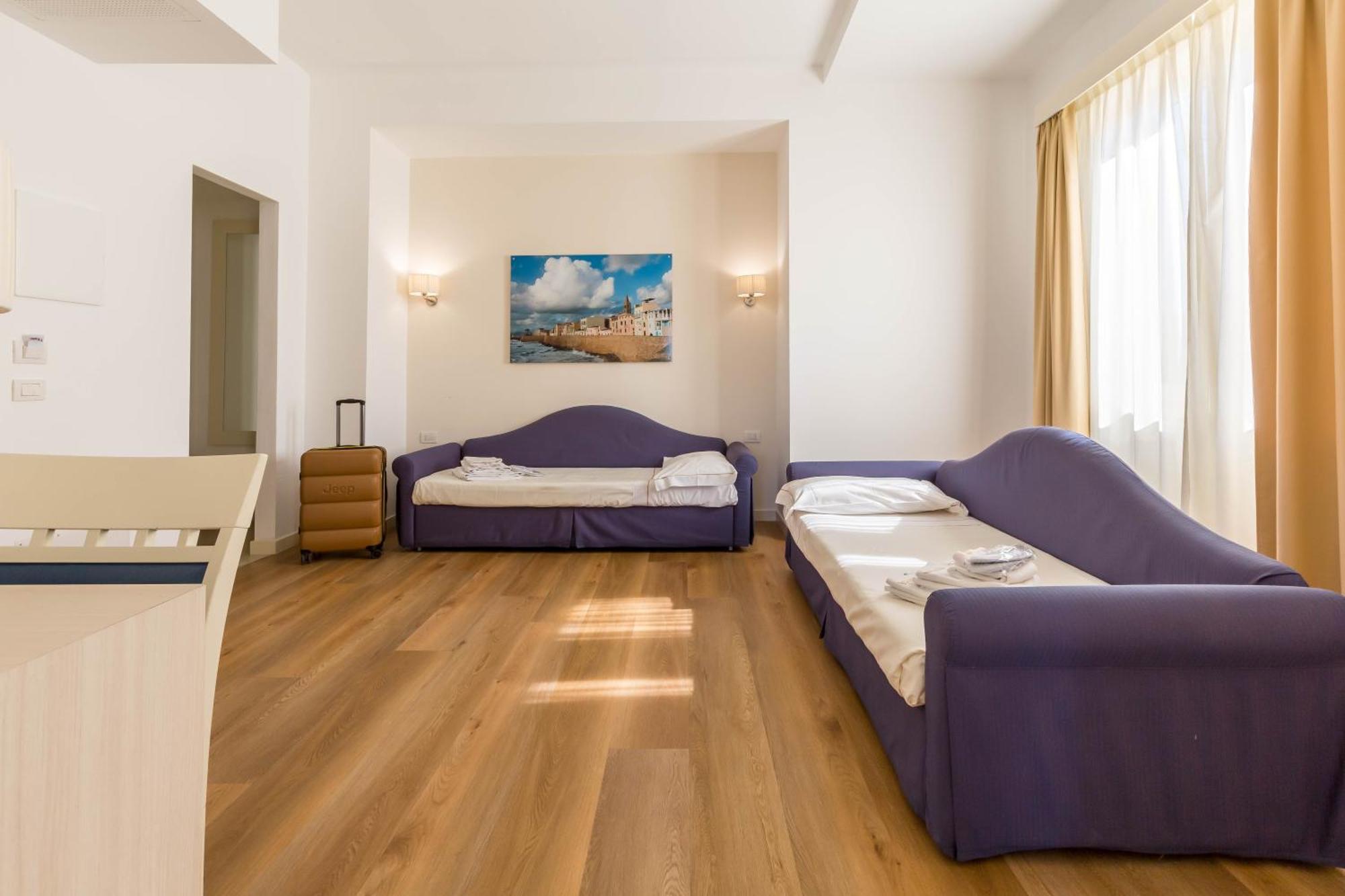 Hotel Catalunya Alghero Bagian luar foto