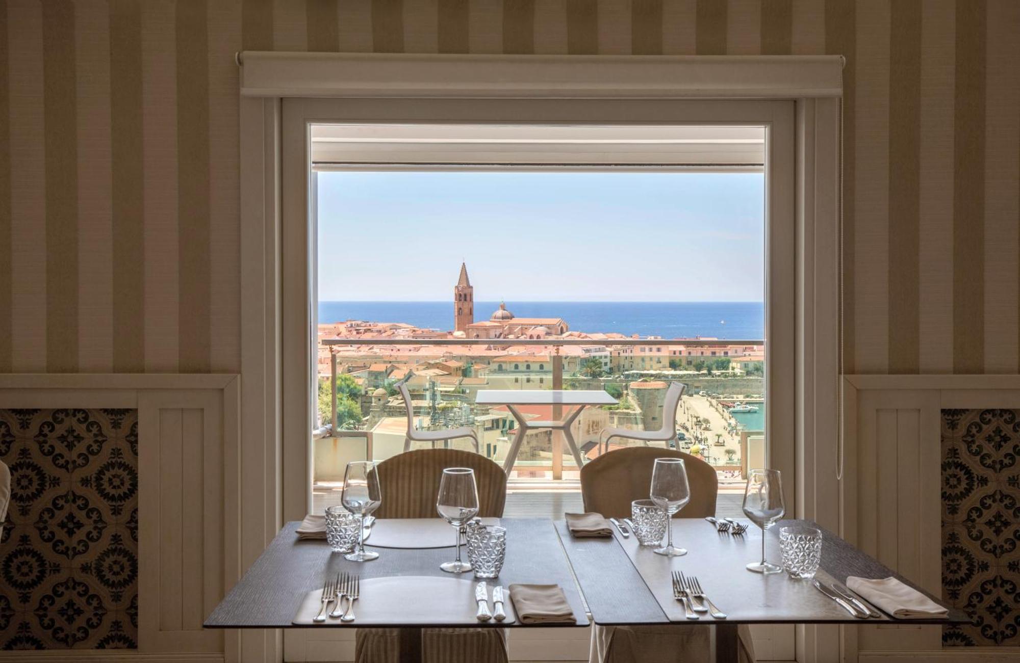 Hotel Catalunya Alghero Bagian luar foto