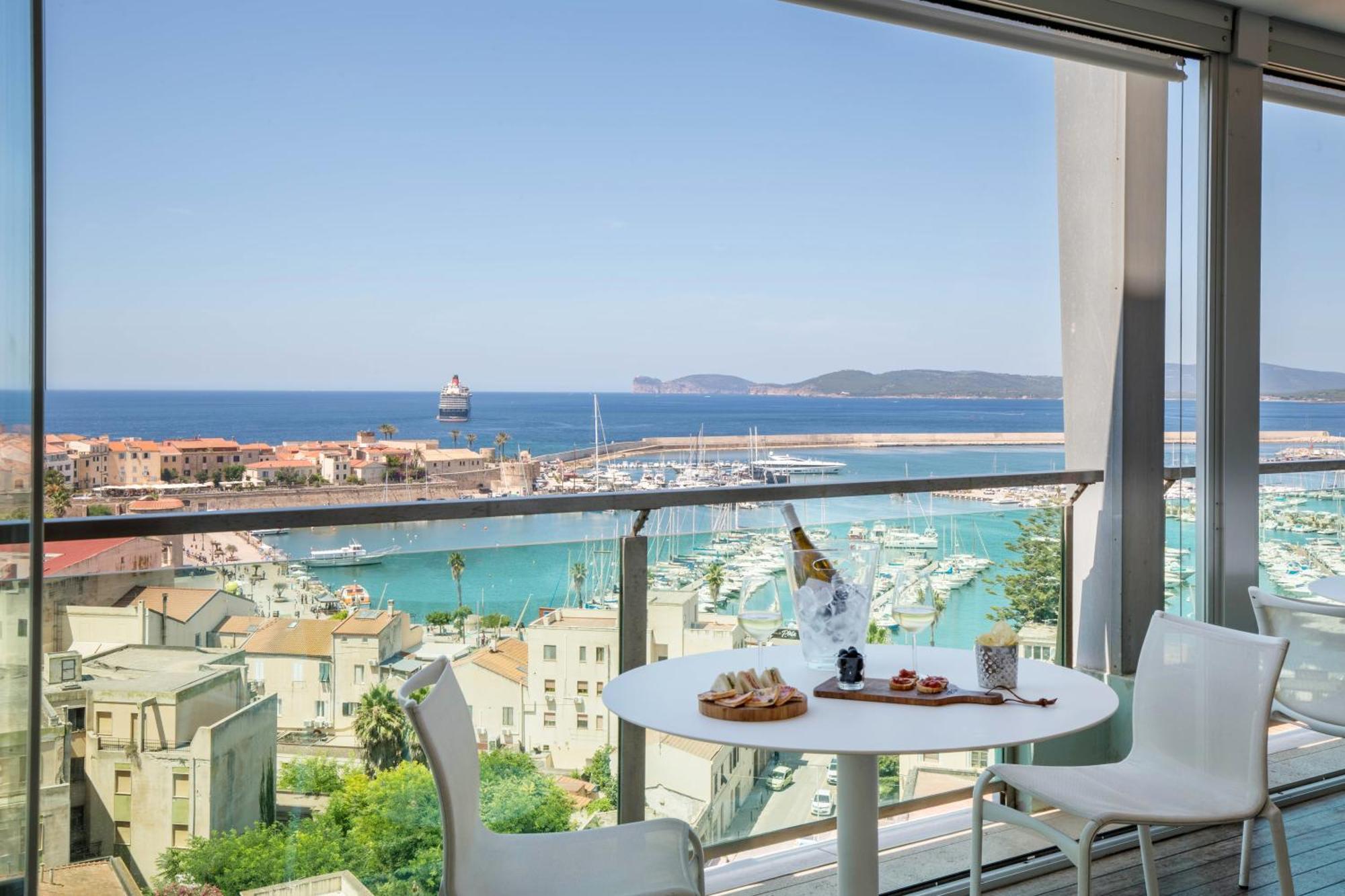 Hotel Catalunya Alghero Bagian luar foto