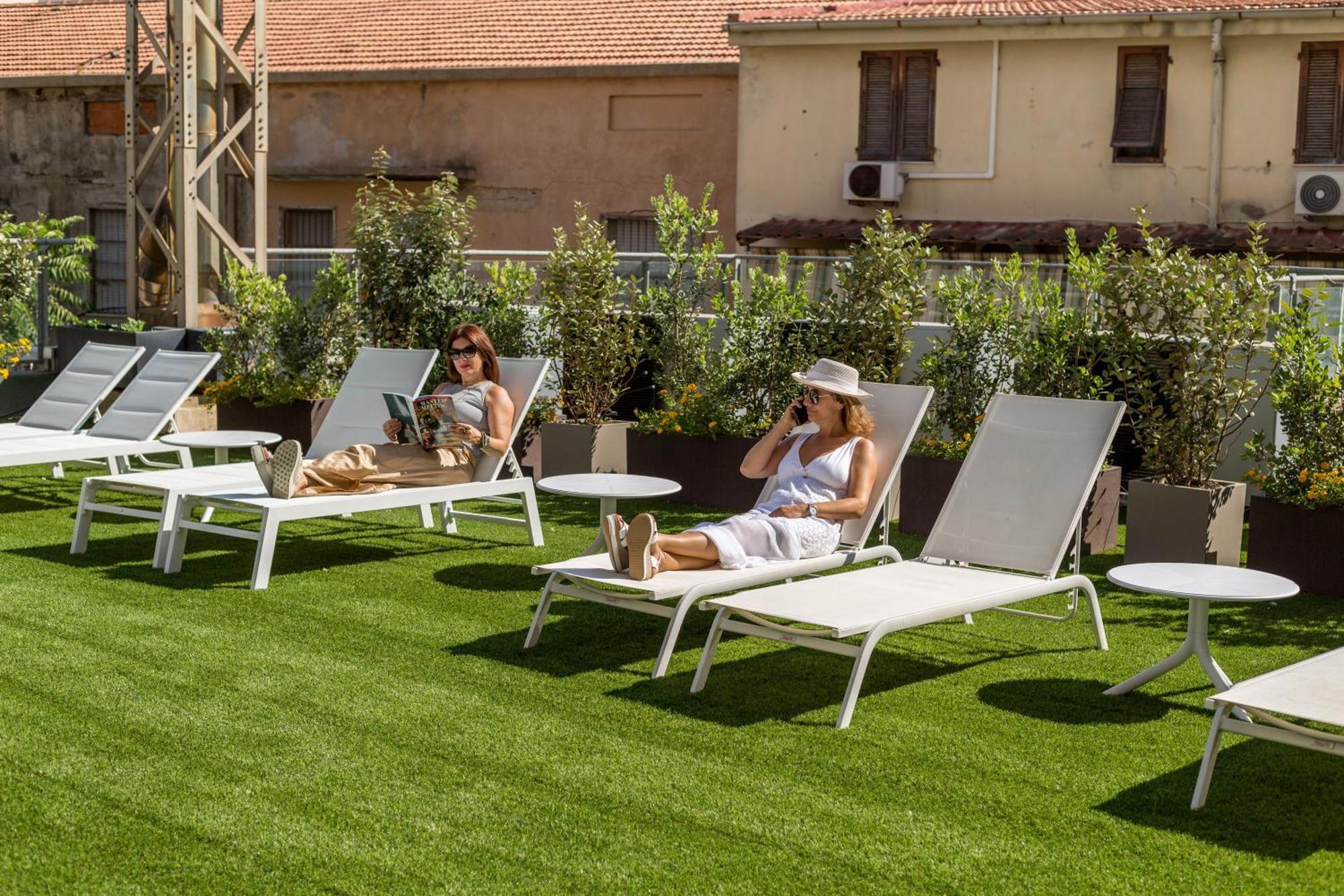 Hotel Catalunya Alghero Bagian luar foto